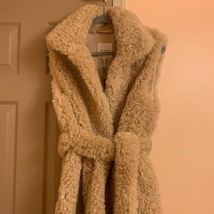 Brand new long faux shearling vest.   Avec Les Filles